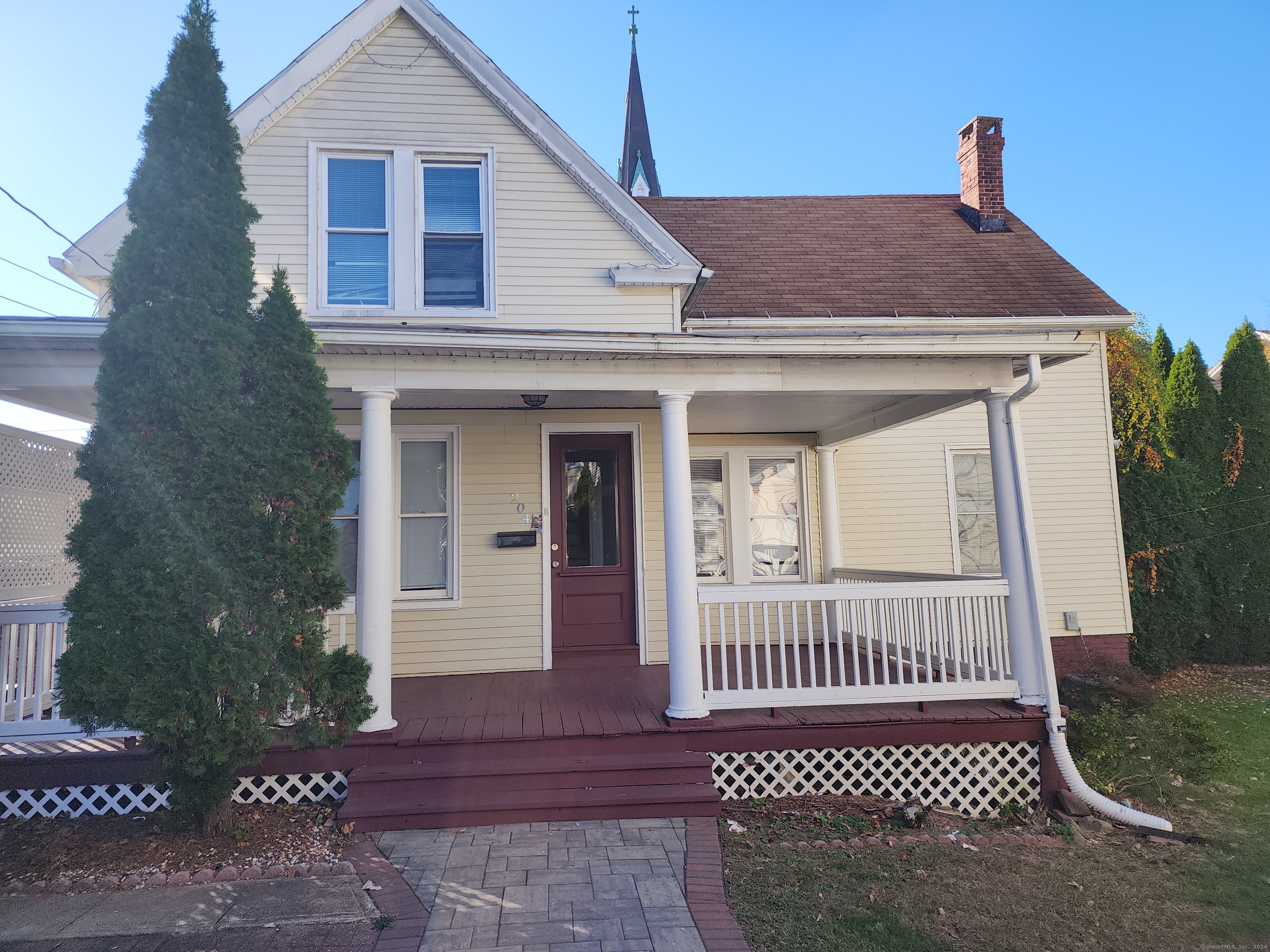 a view of a house with a porch