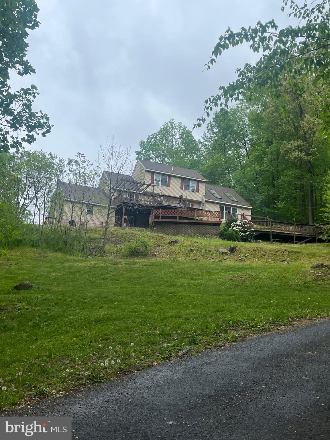 a view of a house with a big yard