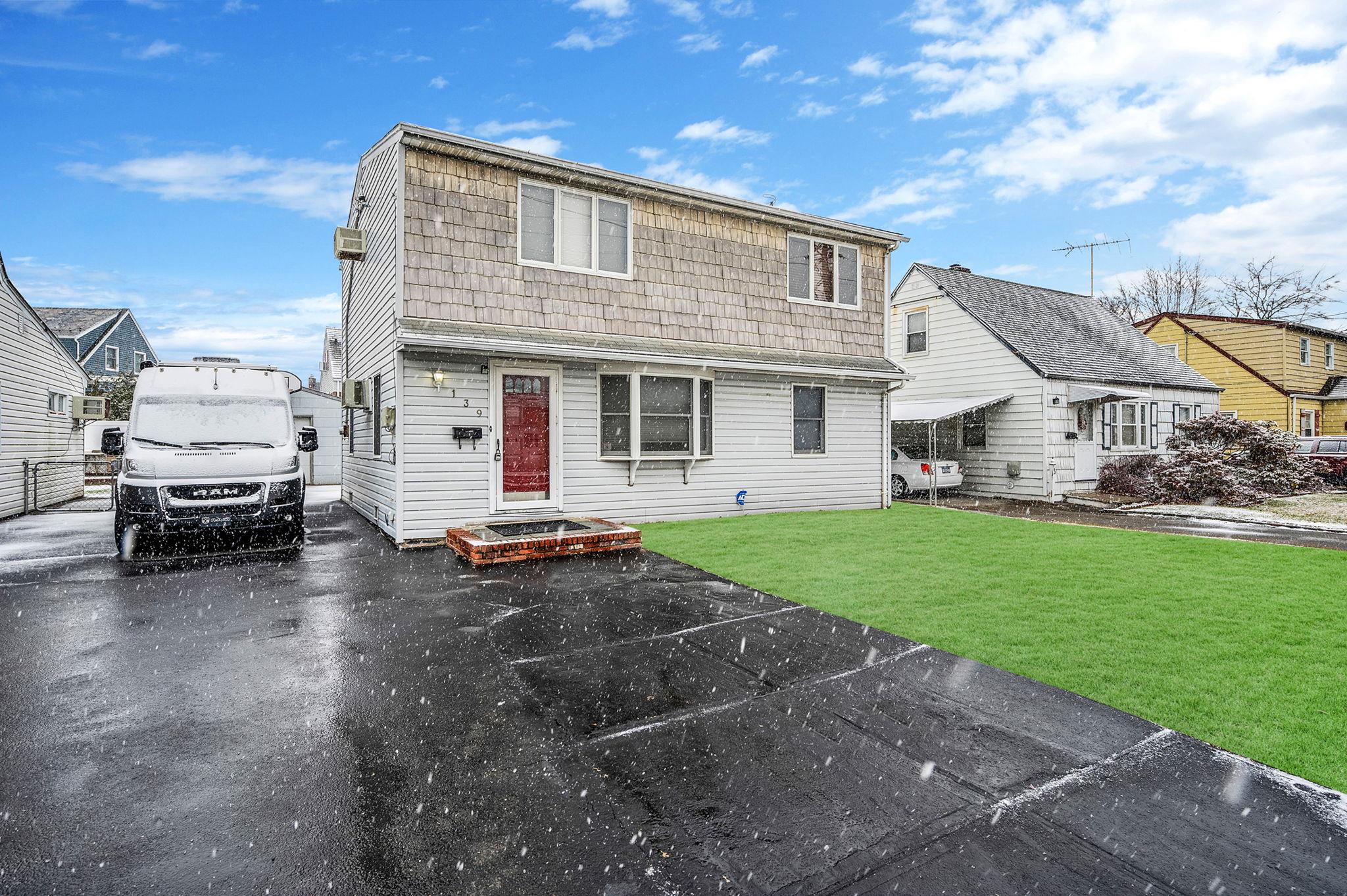 View of front of home with a front lawn