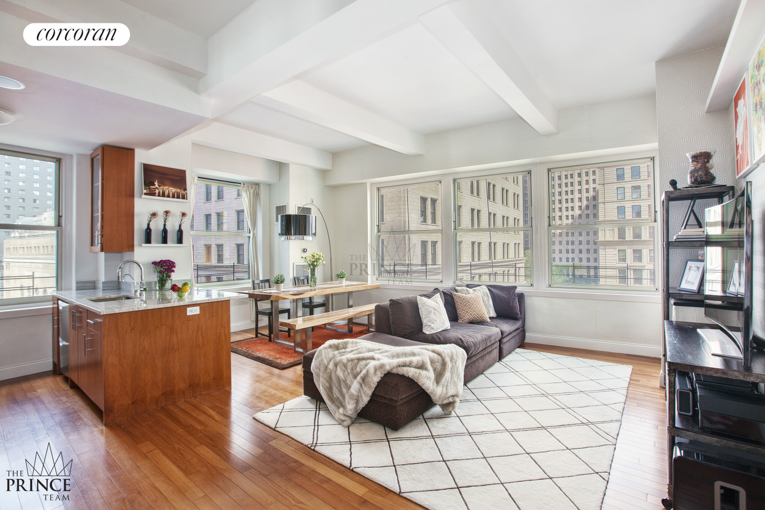 a living room with furniture and a flat screen tv