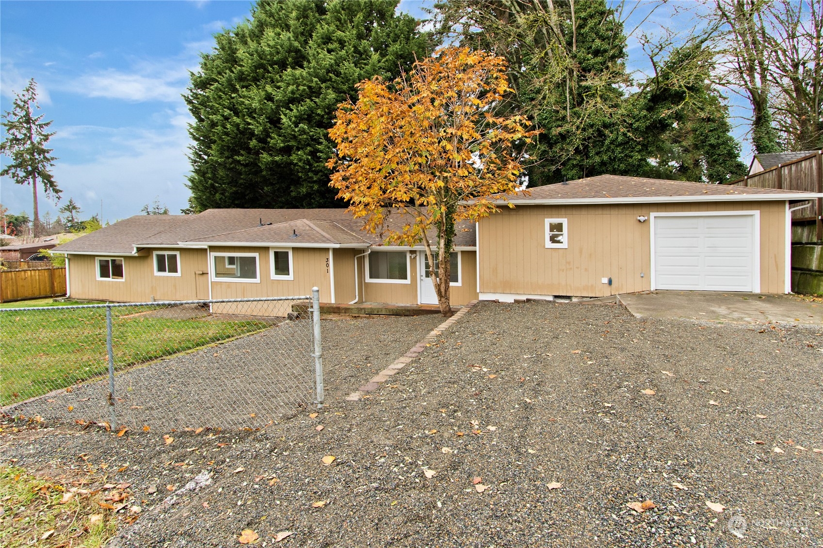 front view of a house with a yard