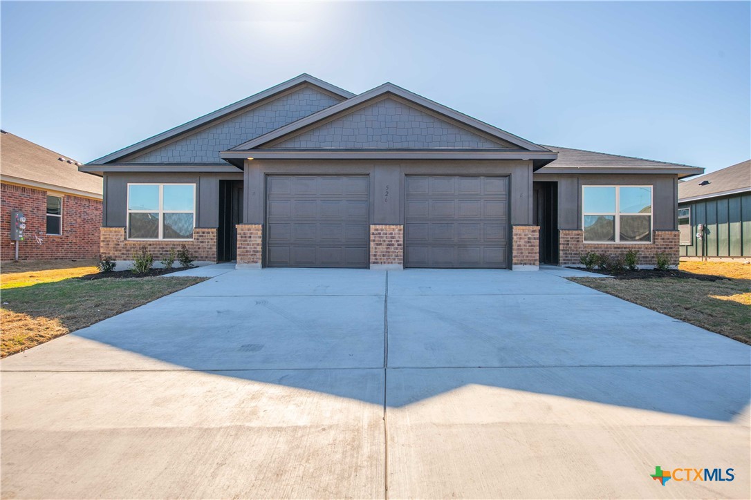 a view of a house with a patio