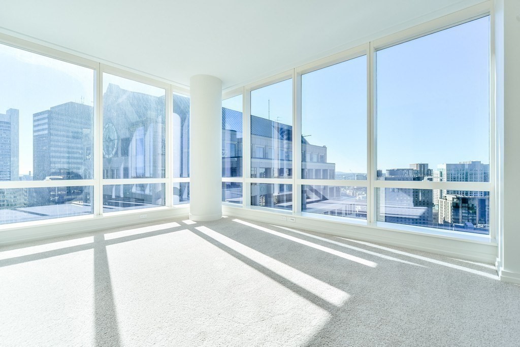 a view of a balcony with city view