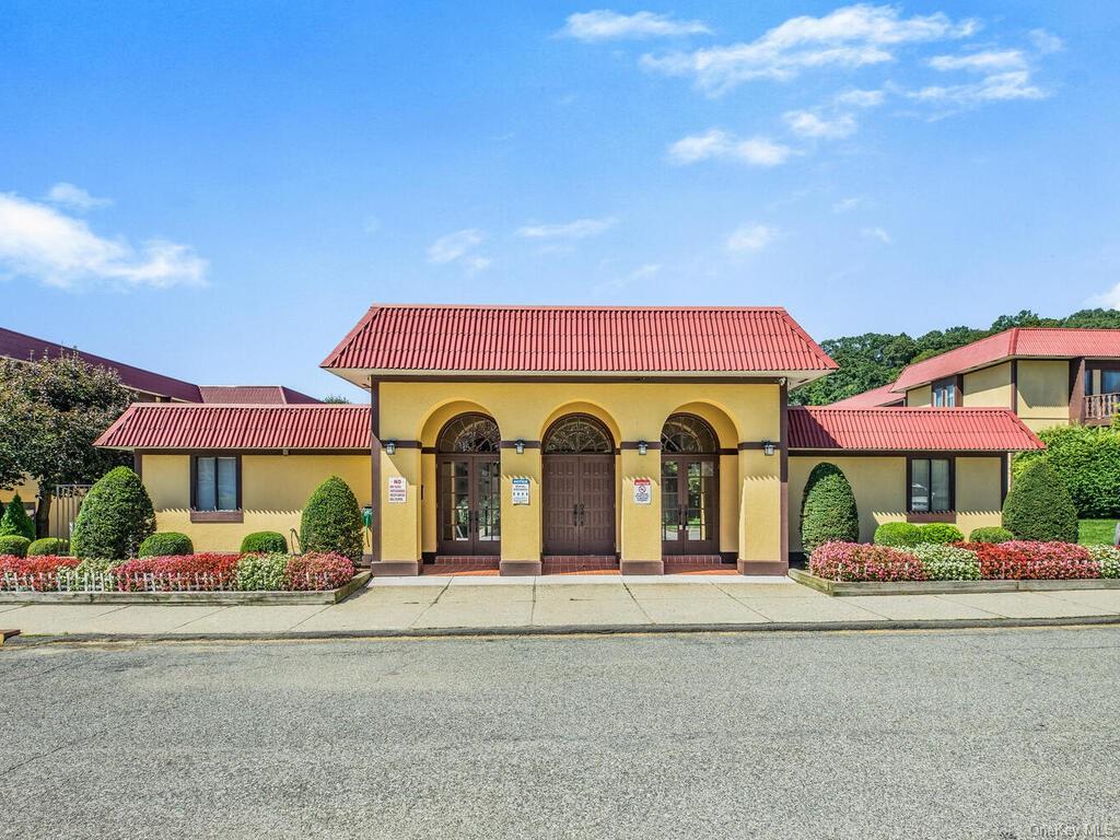 front view of a house with a street view