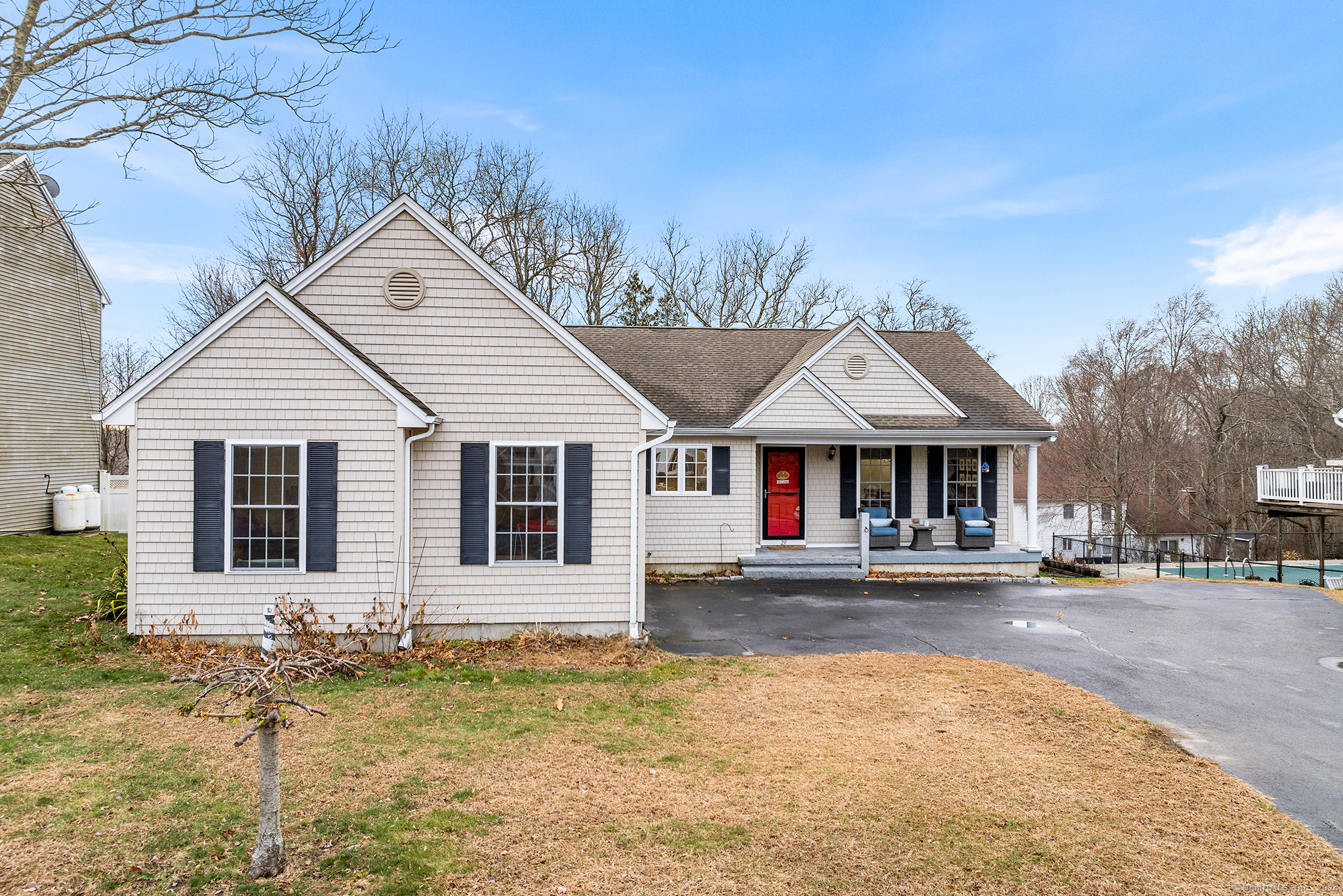 a front view of a house with a yard