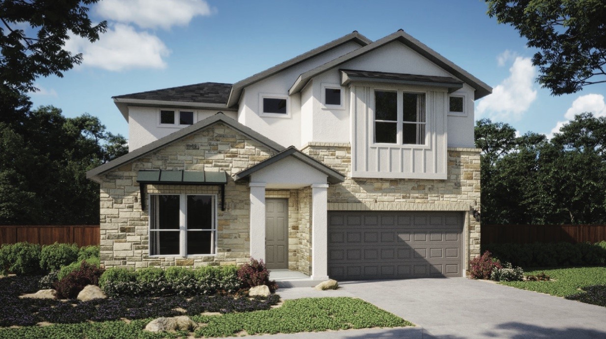 a front view of a house with garage