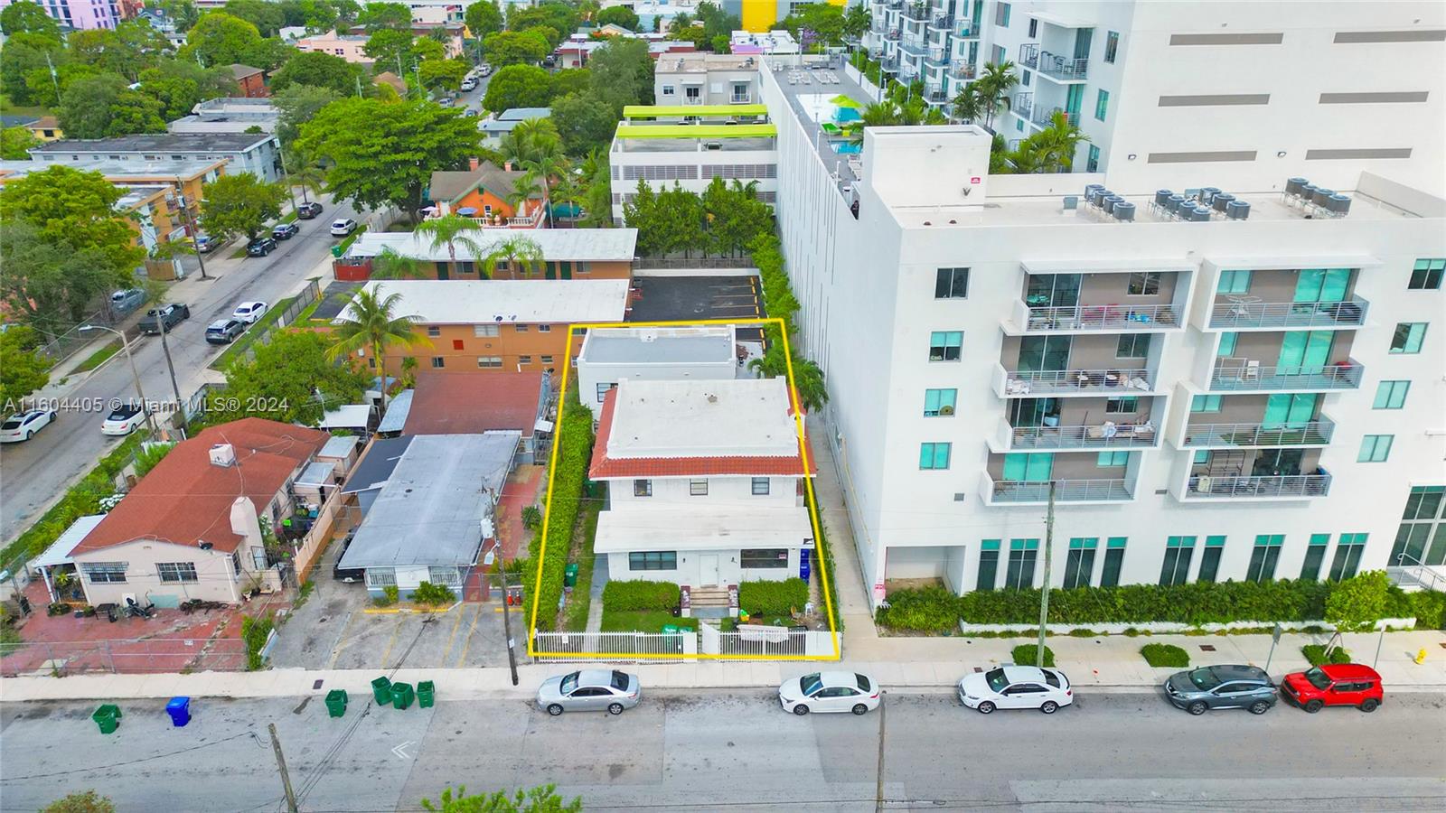 an aerial view of multi story residential apartment building