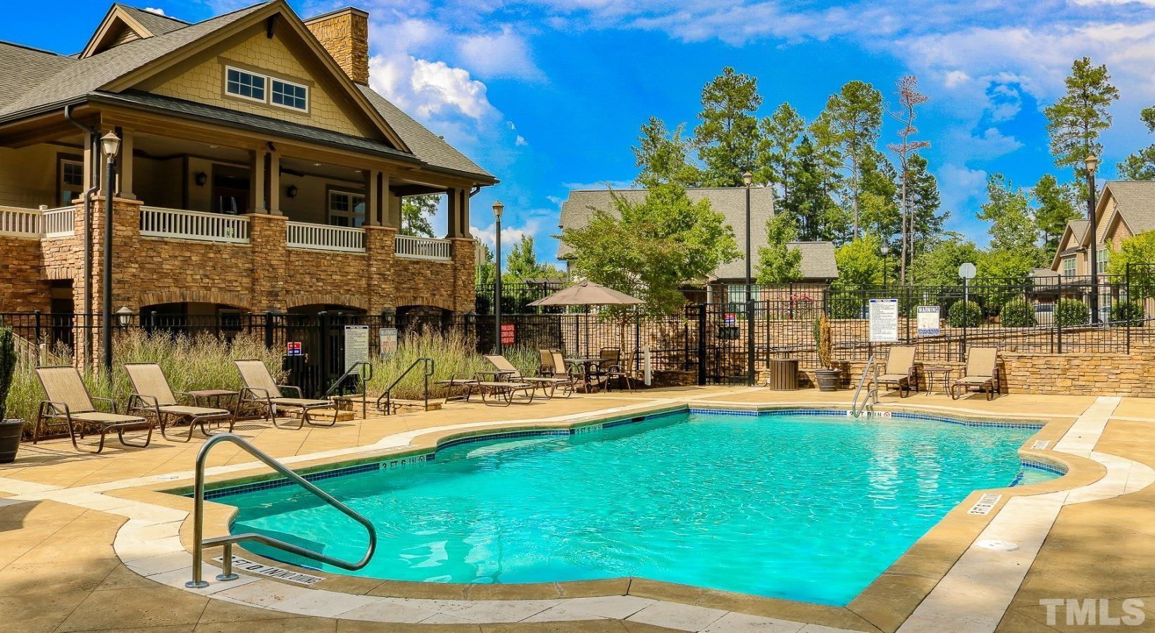 a view of a house with swimming pool