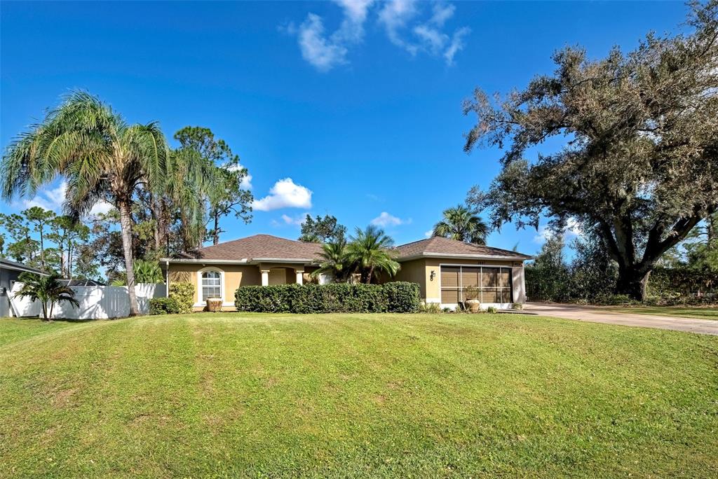 Front view of the home with mature landscaping.  Wonderful curb appeal.