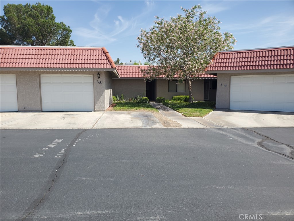 a front view of a house with a garage