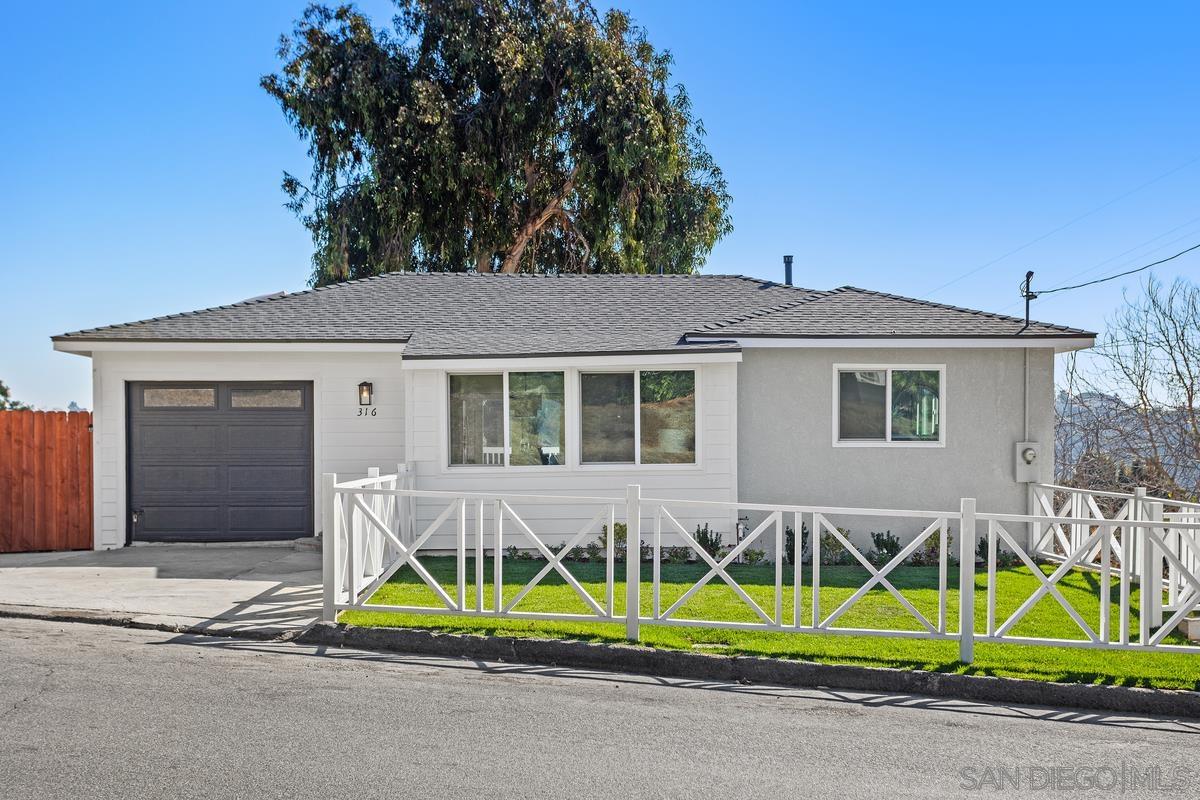 a house with trees in front of it