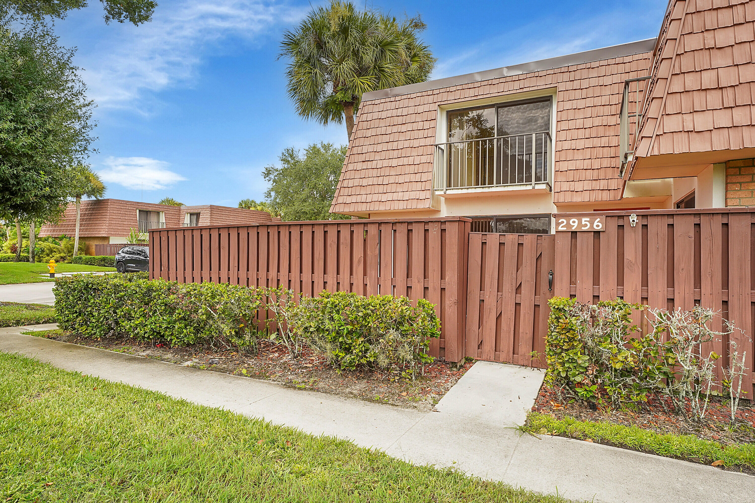 a front view of a house having yard