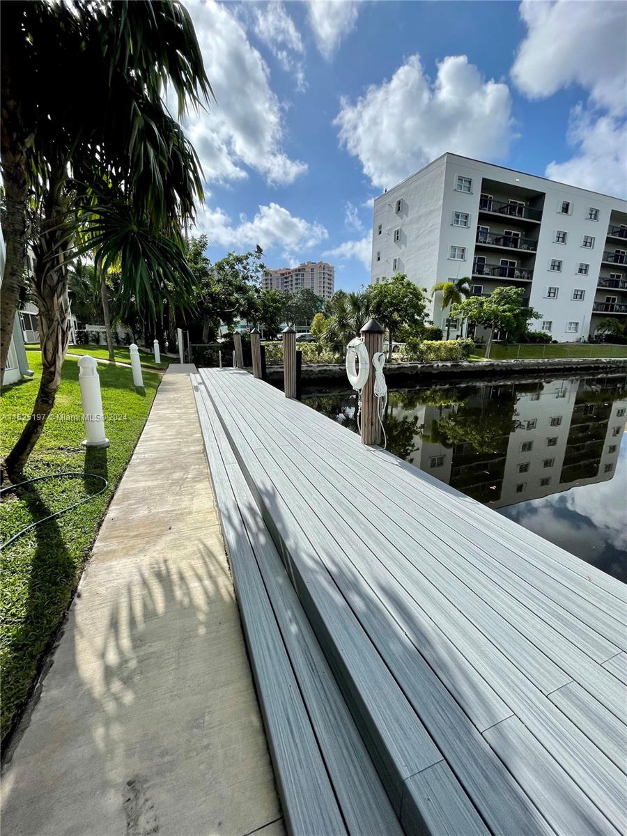 a view of swimming pool with a patio