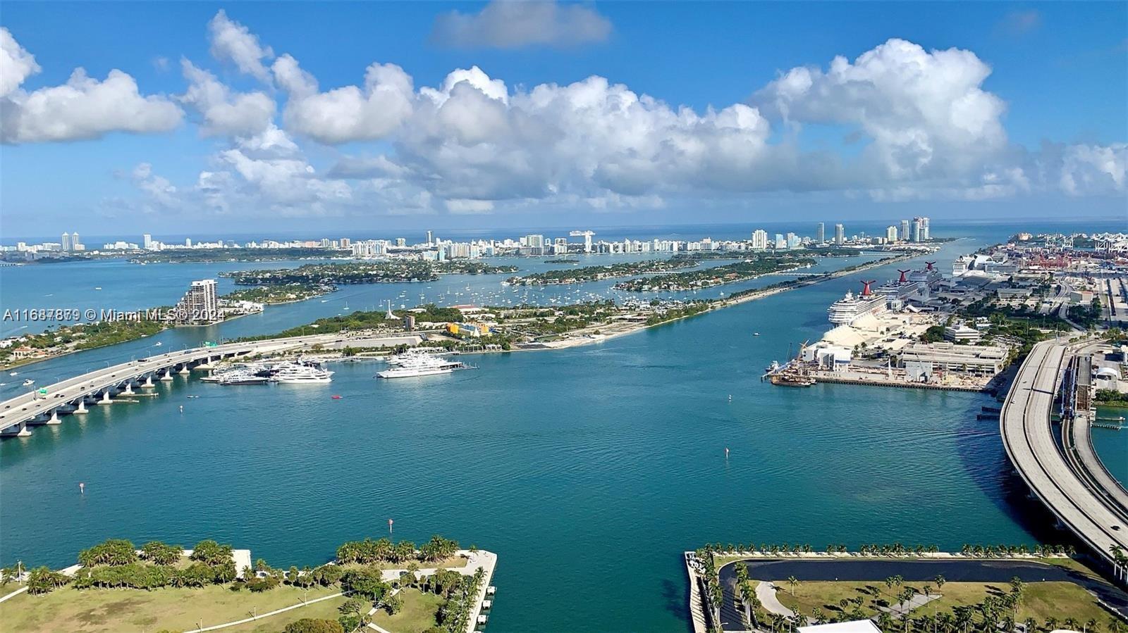 a view of a lake with a city view