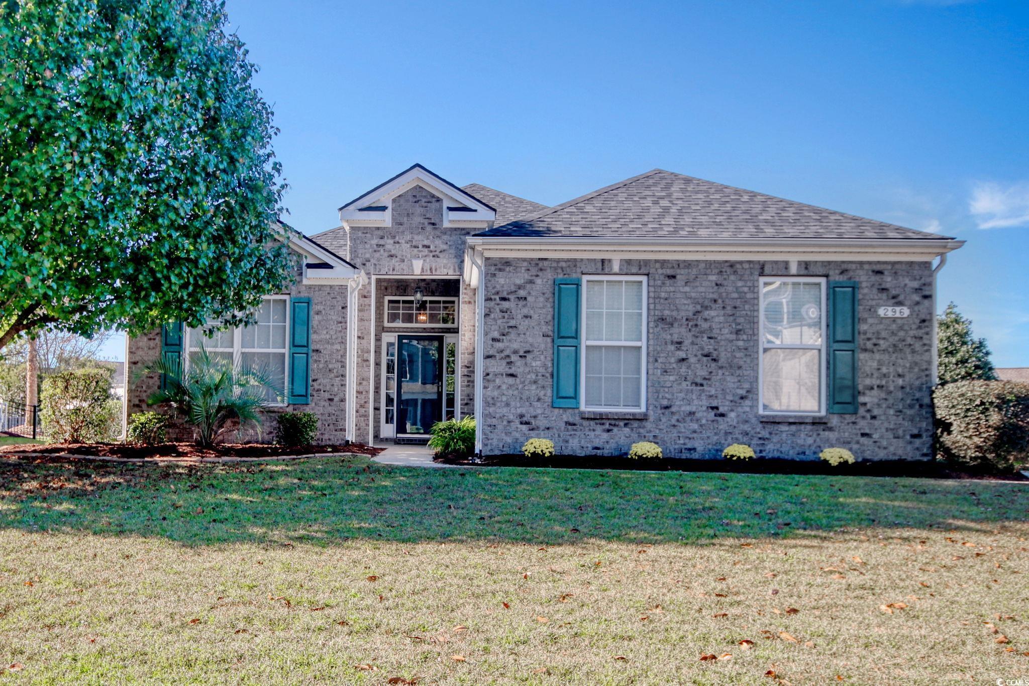 View of front of property featuring a front lawn