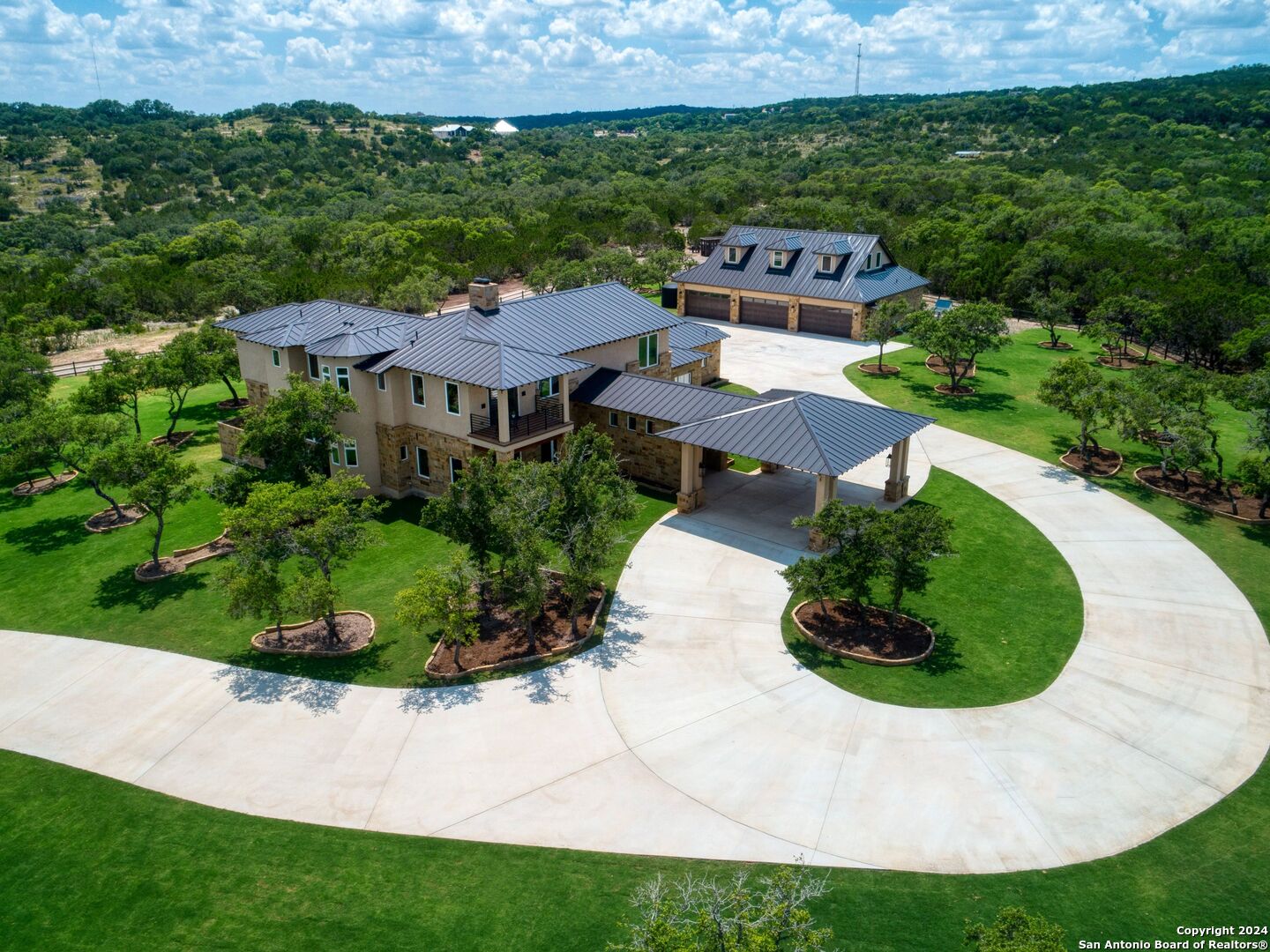 an aerial view of a house with garden