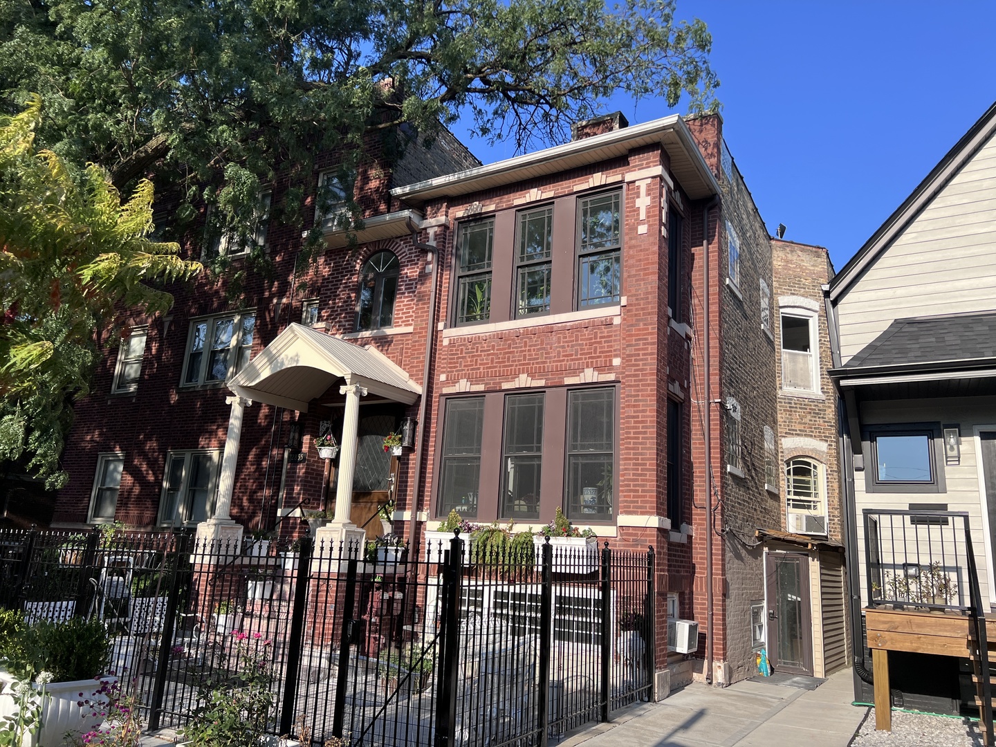 a front view of a house with parking