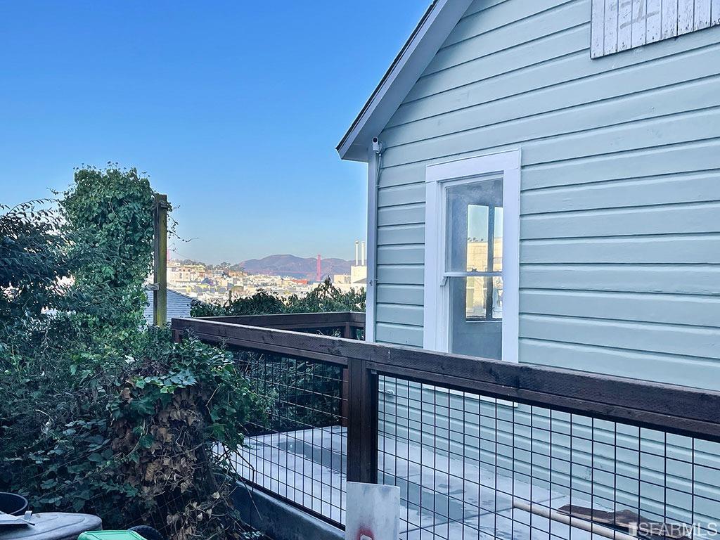 a view of a balcony with an outdoor space