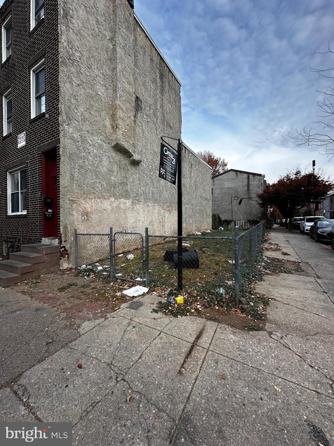 a view of a street with sitting area