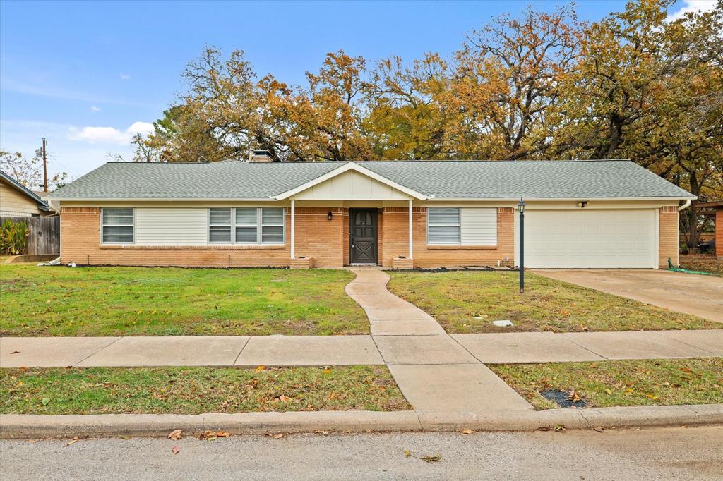 front view of a house and a yard