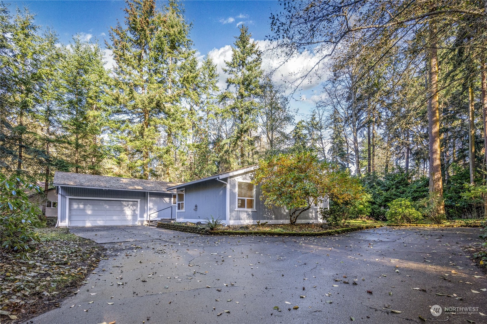 a view of a house with a tree