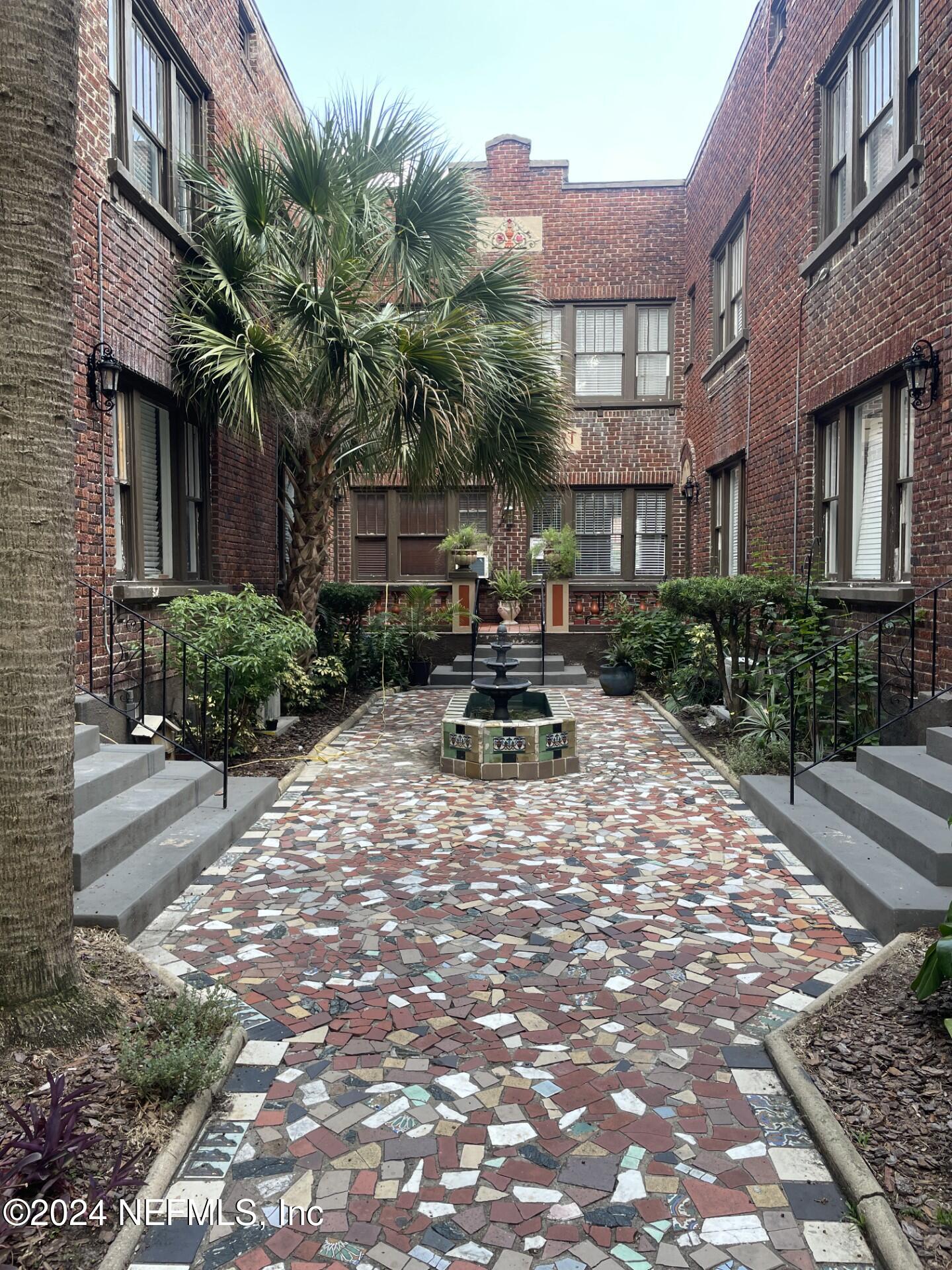 a view of a building with a patio