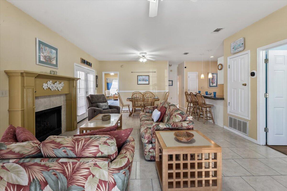 a view of a livingroom with furniture and a fireplace