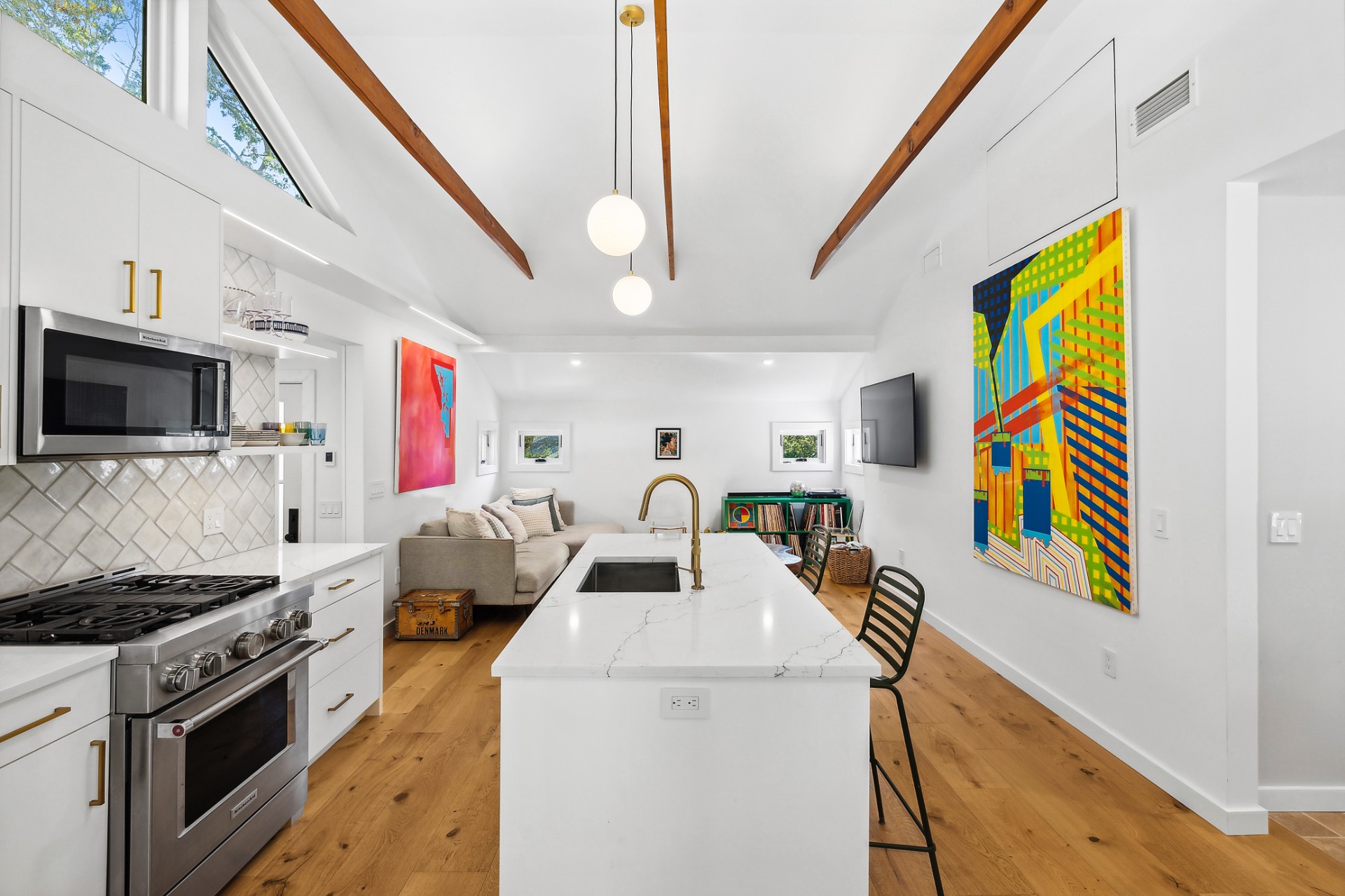 a view of living room with furniture and flat screen tv