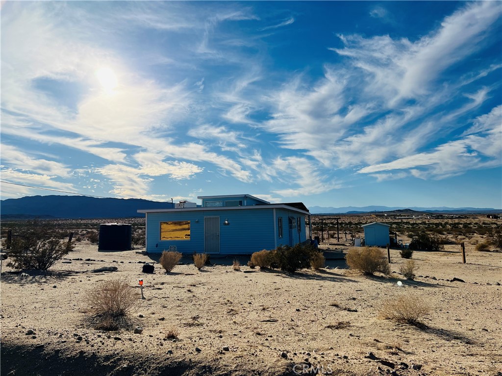 a view of a houses of the snow on the beach