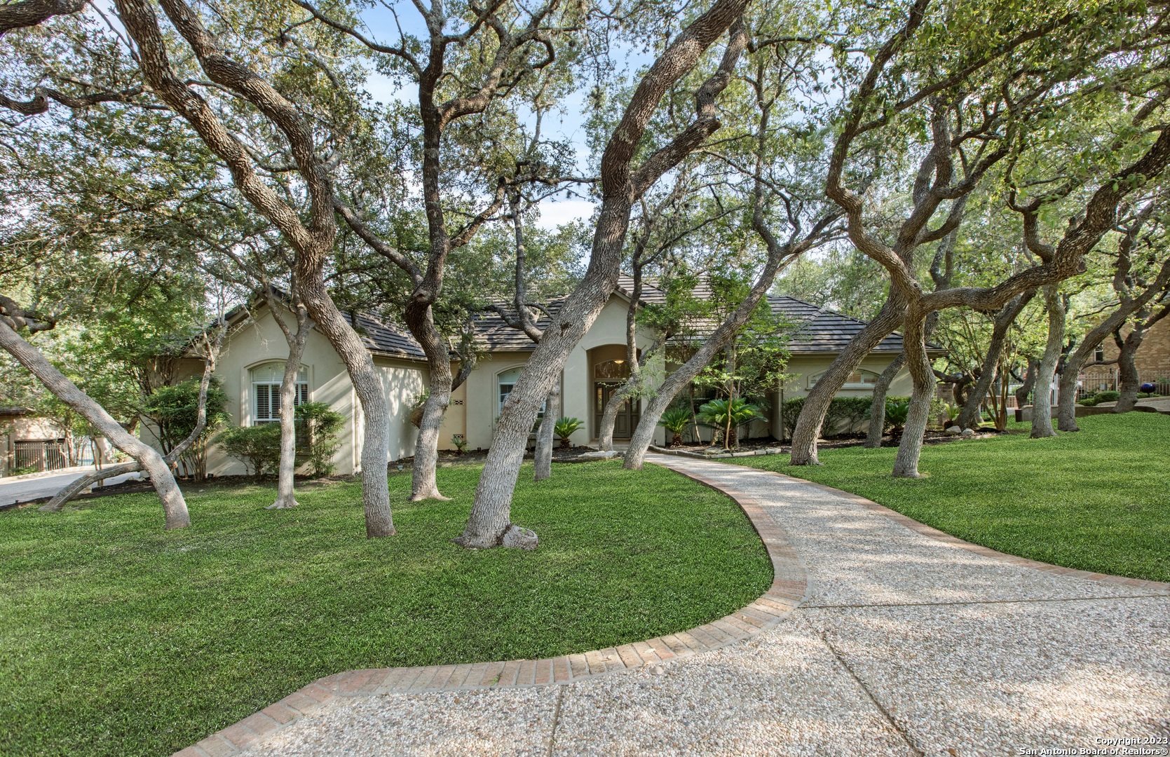 front view of a house with a yard