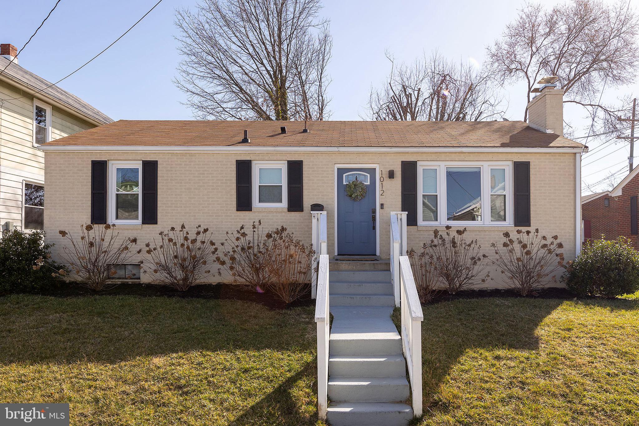 a front view of house with yard