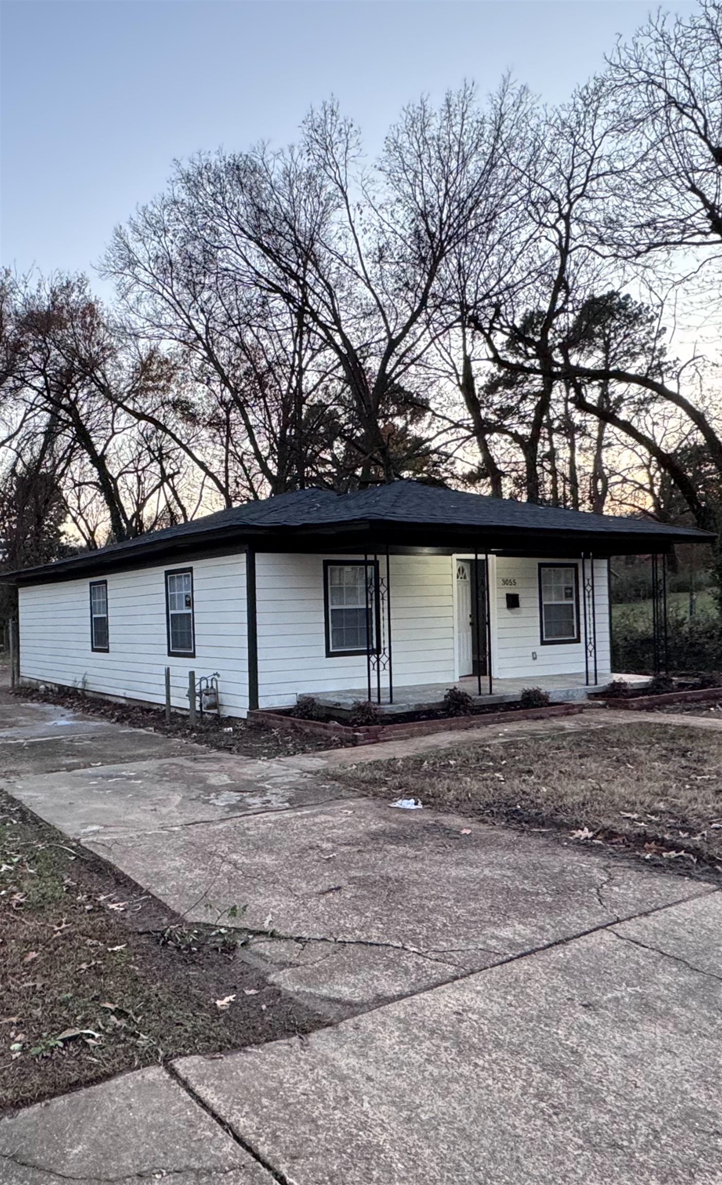 Ranch-style home featuring a porch