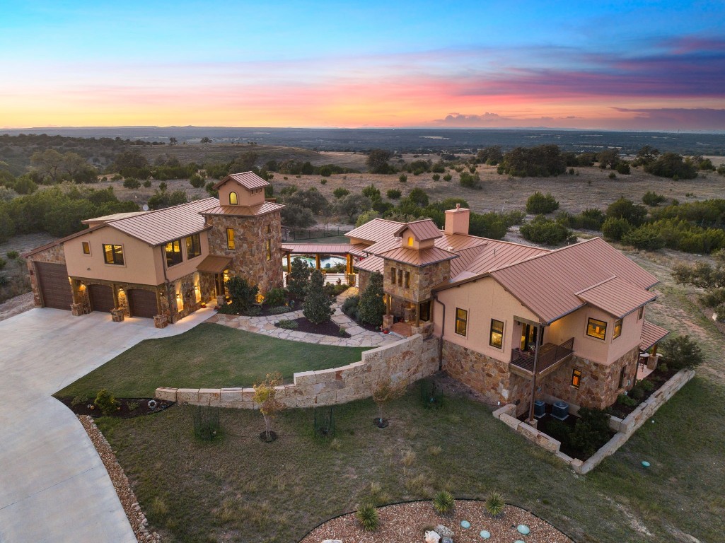 a view of a house with a mountain in the background