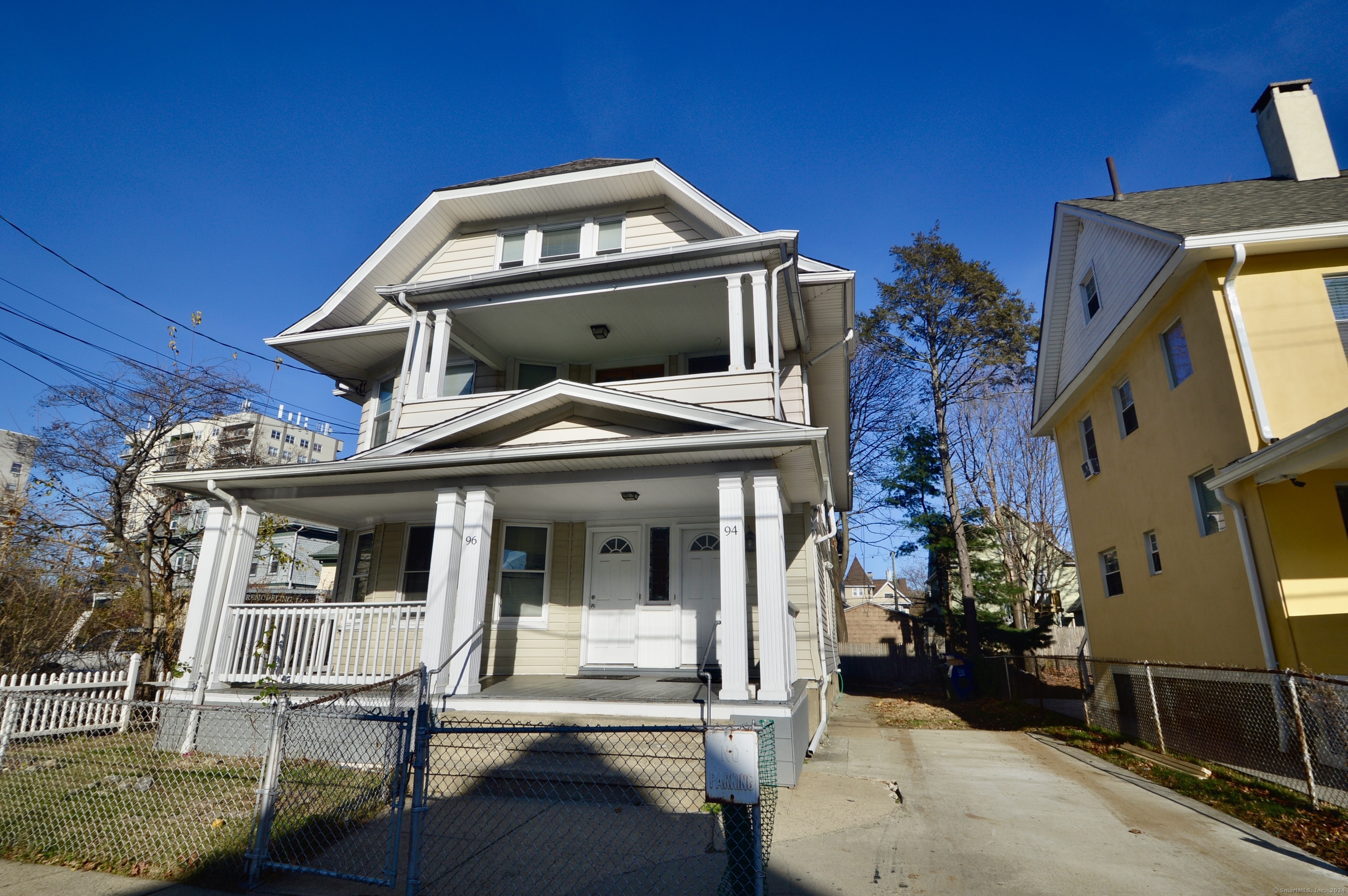 a front view of a house with garage