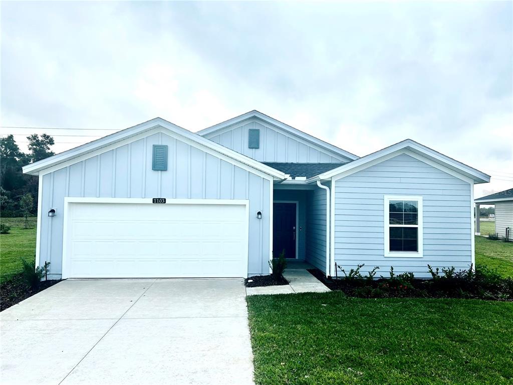 a front view of house with yard