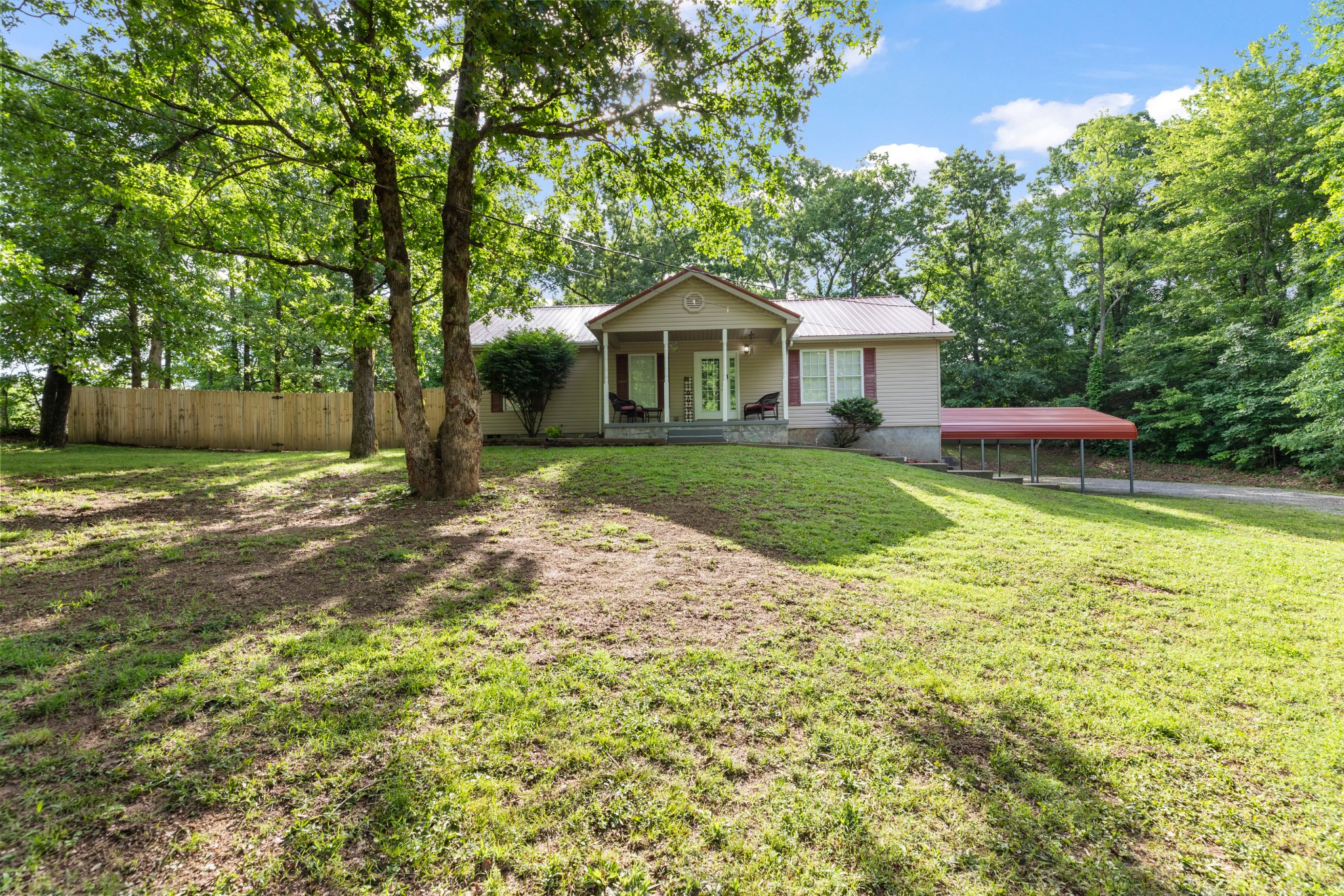 a view of a house with a yard