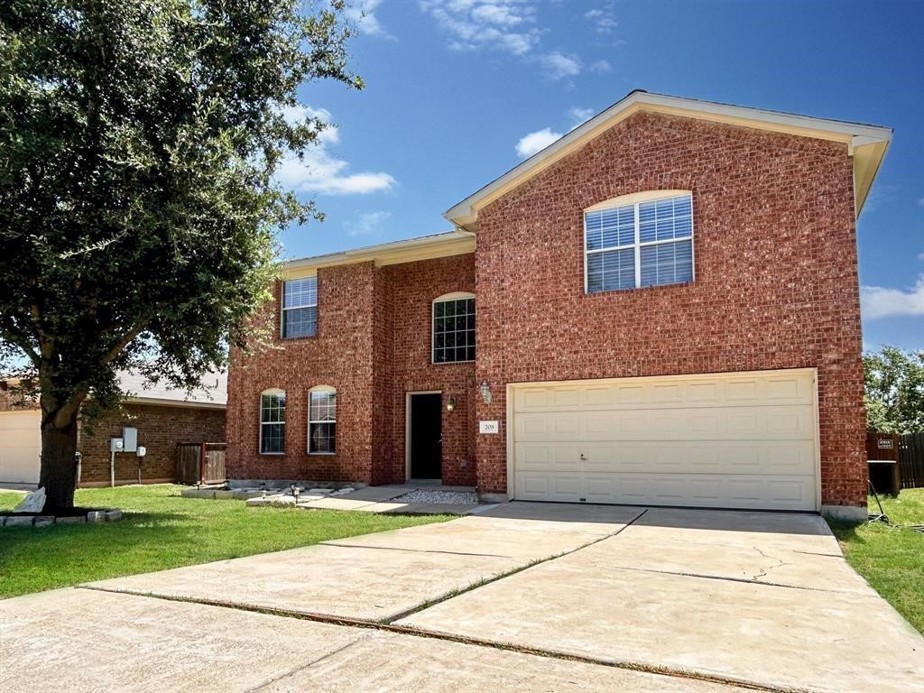 a front view of house with yard