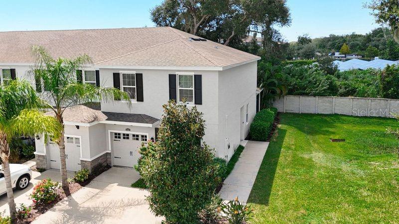 a aerial view of a house with swimming pool