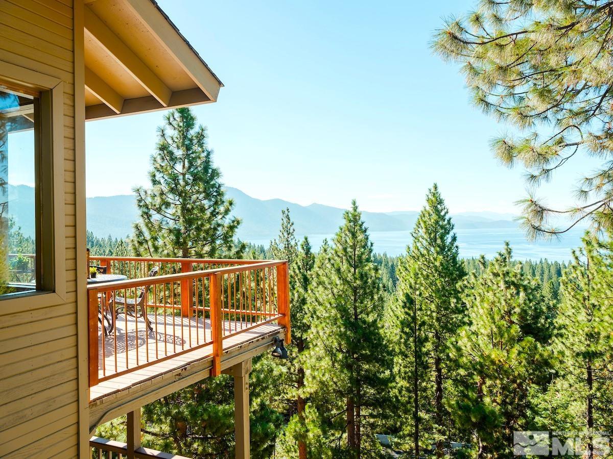 a view of a balcony with an outdoor space