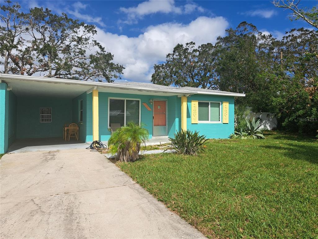 front view of a house with a yard