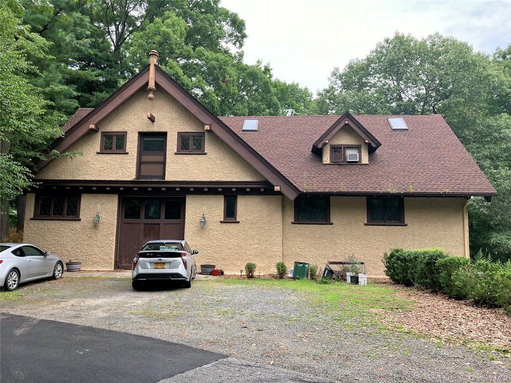 a house with trees in the background