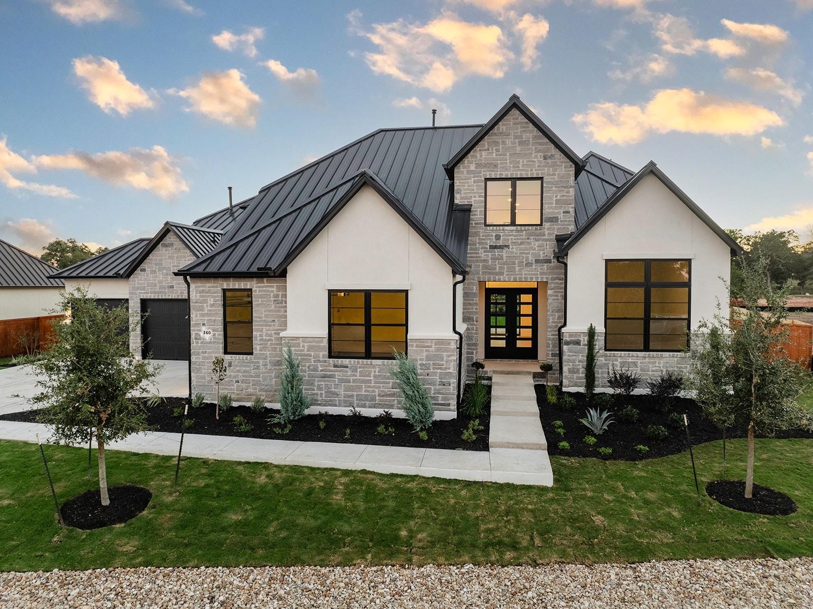 a front view of house with yard and green space