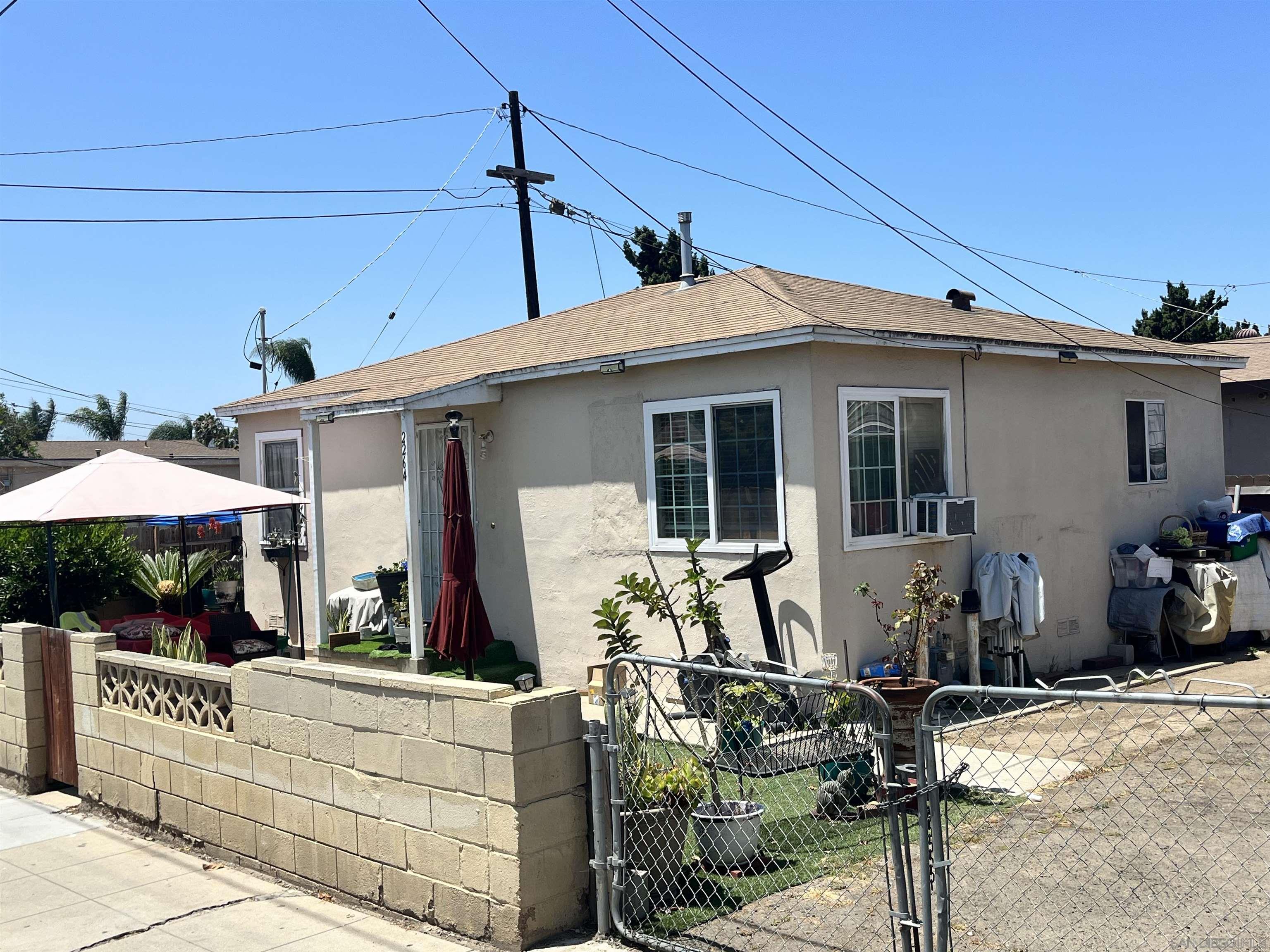 a view of house with outdoor space and porch