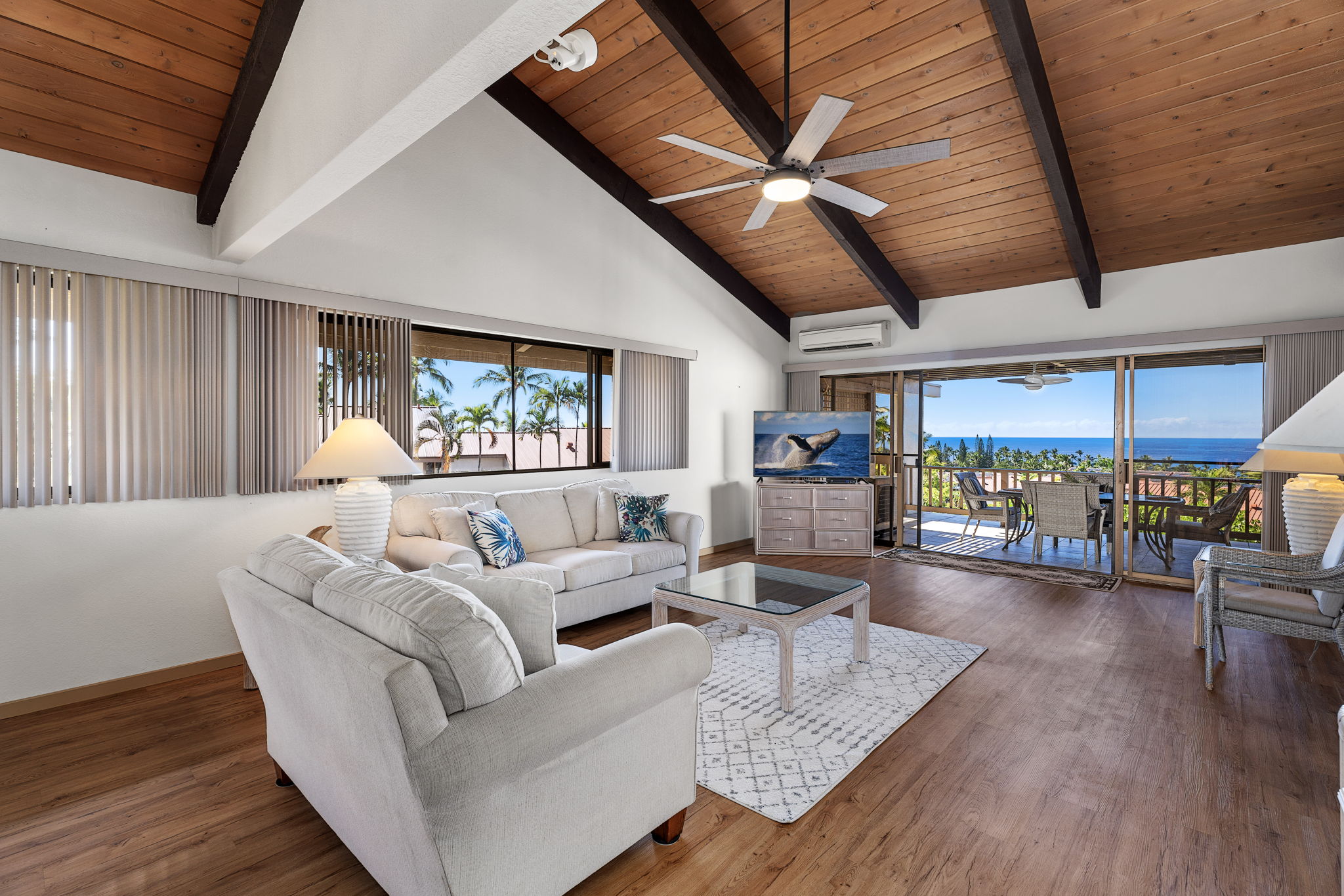 Living room out to lanai and look at the beautiful ocean view!