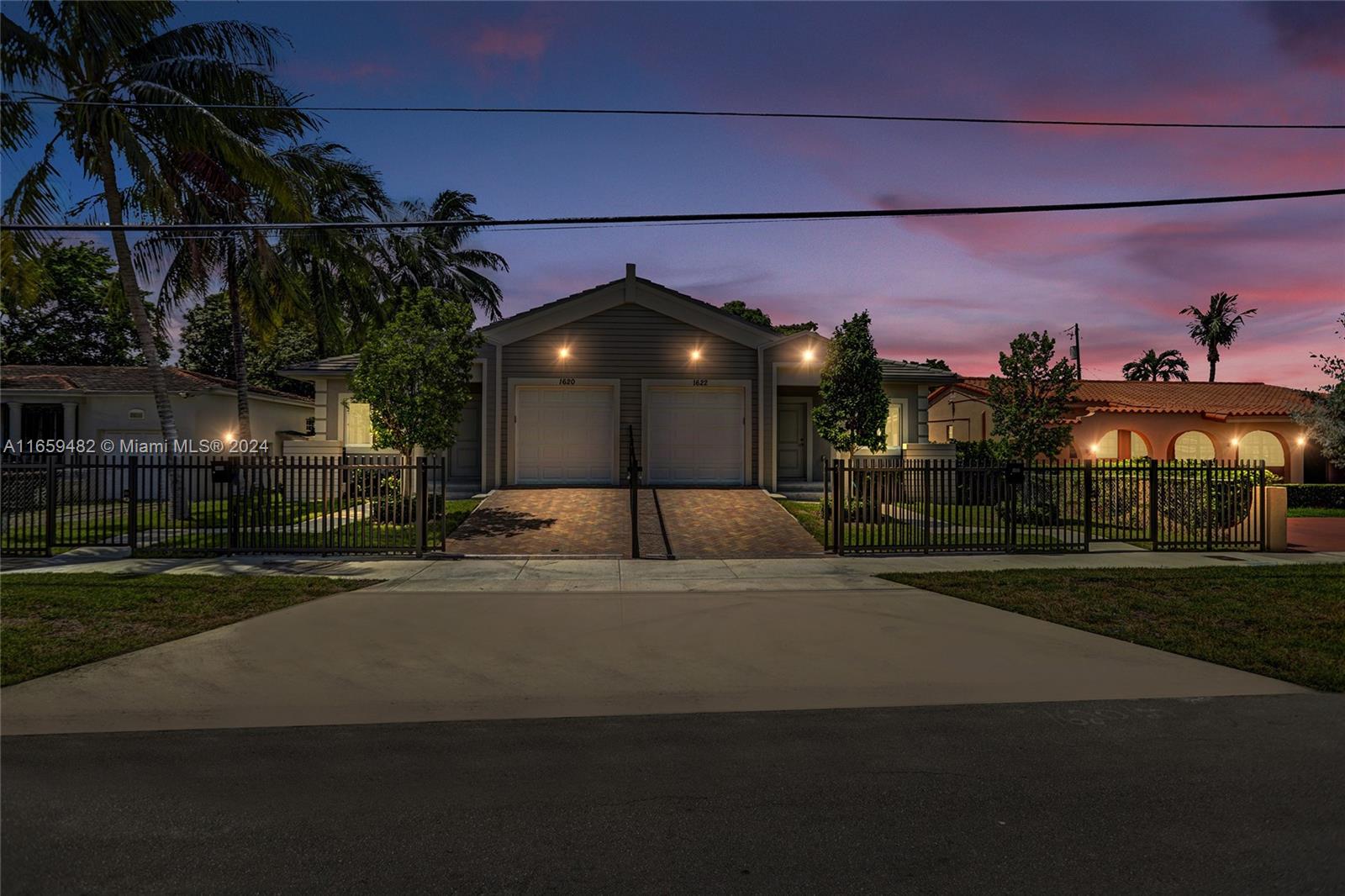 a view of a building with a yard