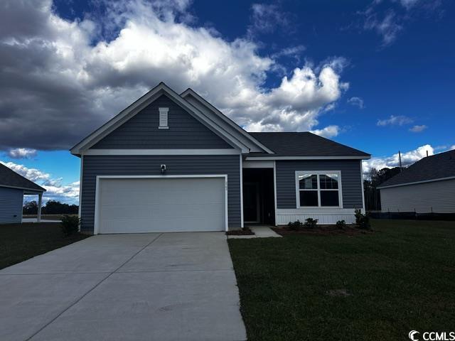 View of front of home featuring a garage and a fro