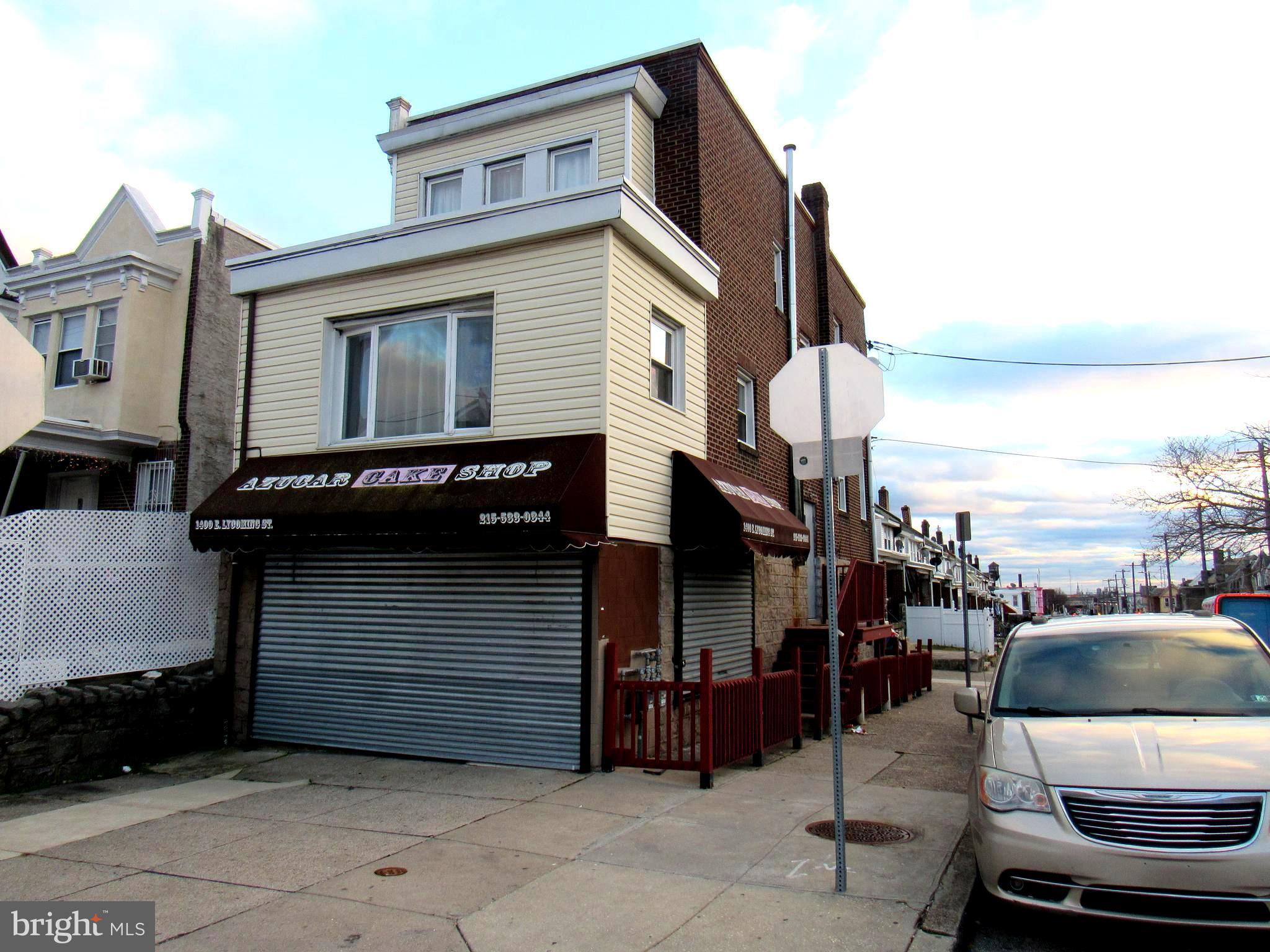 a view of a house with a parking space