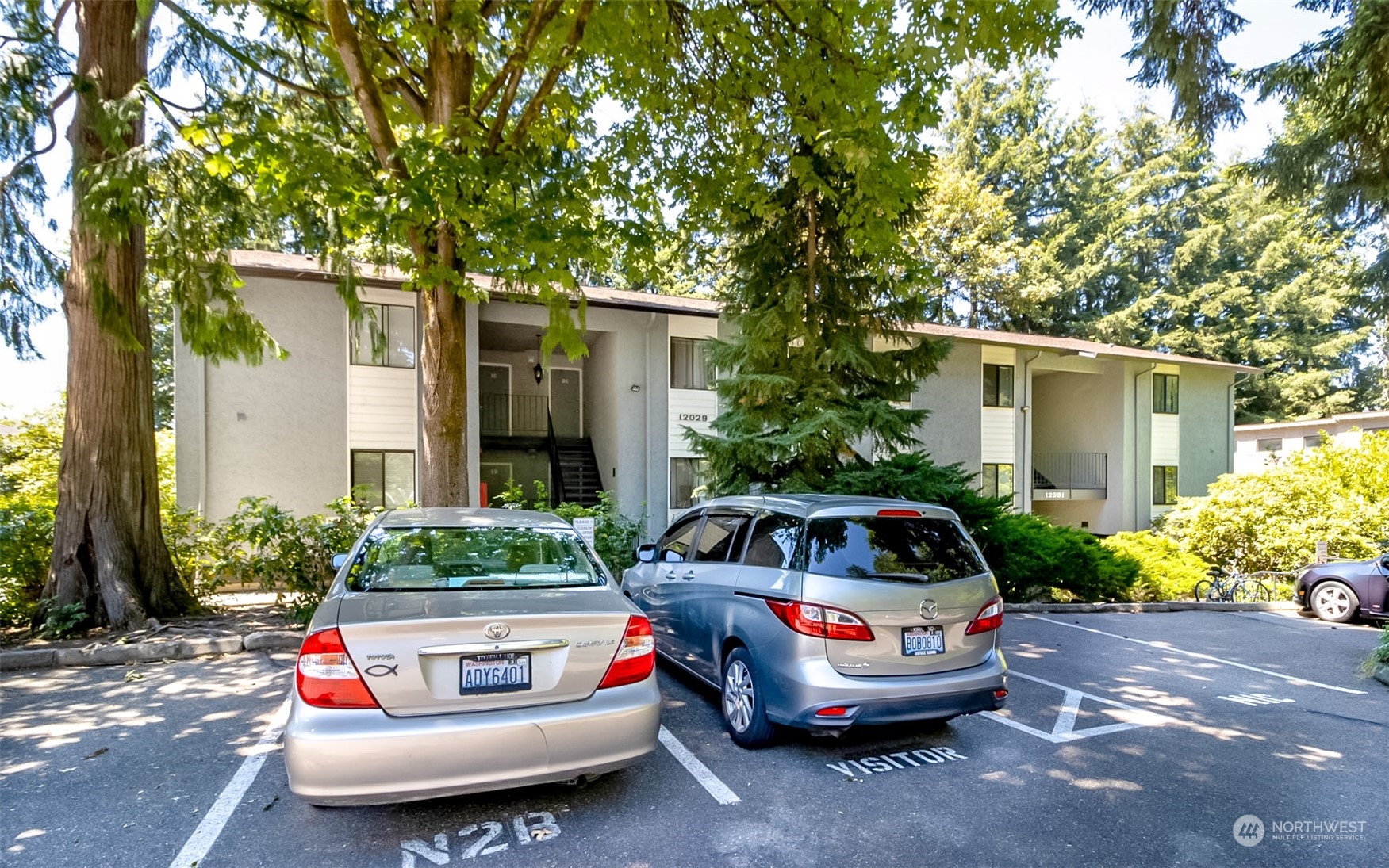 a car parked in front of a house