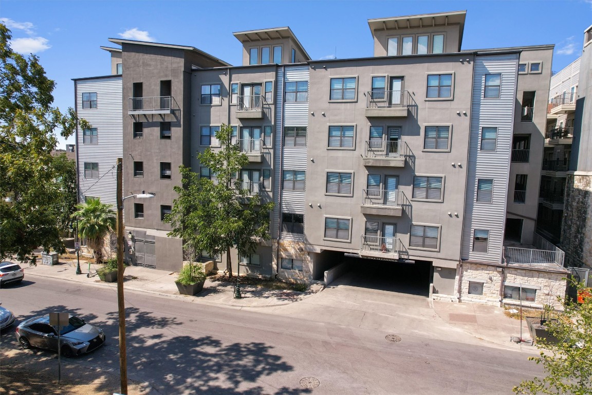 a front view of a building with street view