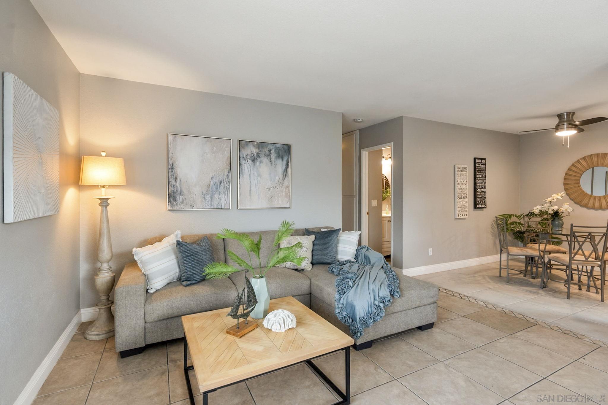 a living room with furniture and a table